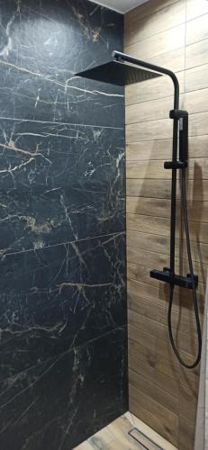 Ένα μπάνιο στο Domki Góralskie Hawrań i Murań z jacuzzi