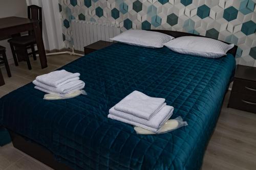 
Кровать или кровати в номере База отдыха повышенного комфорта Гранд Алтай
