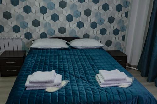 
Кровать или кровати в номере База отдыха повышенного комфорта Гранд Алтай
