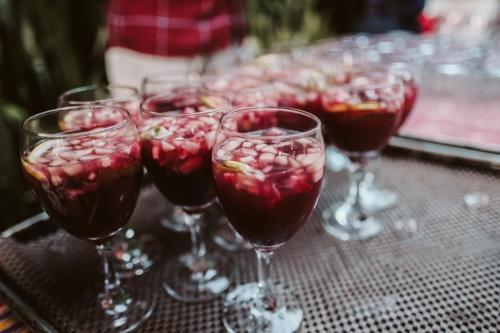 a group of wine glasses sitting on a table at Hotel La Casa del Mundo in Jaibalito
