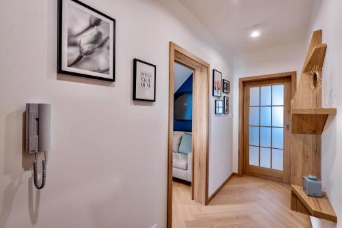 TV a/nebo společenská místnost v ubytování TATRYSTAY Cactus Luxury Apartments High Tatras