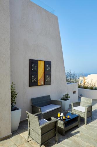 Coin salon dans l'établissement Alyvia Suites