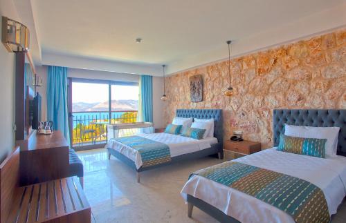 Ένα ή περισσότερα κρεβάτια σε δωμάτιο στο Molino Hotel