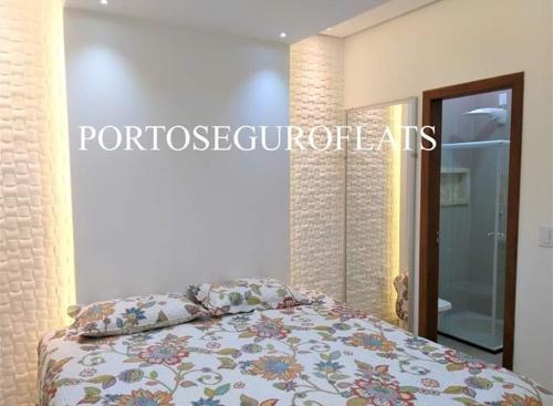 Ein Bett oder Betten in einem Zimmer der Unterkunft Vila dos diamantes flats de luxo lançamento