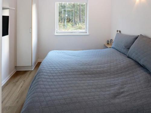 Postel nebo postele na pokoji v ubytování Holiday Home Jægerparken