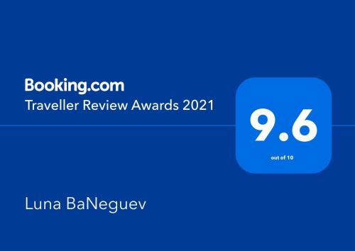 a screenshot of a phone with the travel review awards at Luna BaNeguev in Yeroẖam