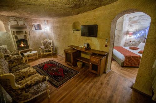 Televisyen dan/atau pusat hiburan di Divan Cave House