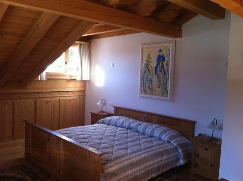 Postel nebo postele na pokoji v ubytování Chesa il Rifugio