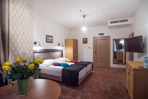 Katil atau katil-katil dalam bilik di Hotel Dwa Księżyce