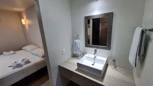 Ett badrum på Hotel Vista Laguna Bacalar