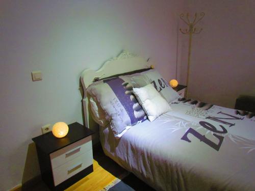 Ένα ή περισσότερα κρεβάτια σε δωμάτιο στο Apartamentos Casas Rurales "Paraje San Blas" TR-BA-00166