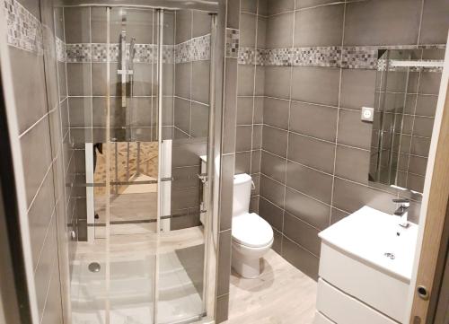 Phòng tắm tại TUILERIE DE LA COTE 4*