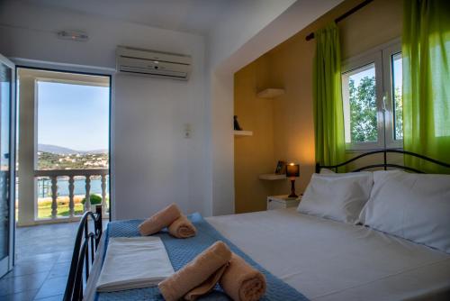 Posteľ alebo postele v izbe v ubytovaní Villa Dina Apartments