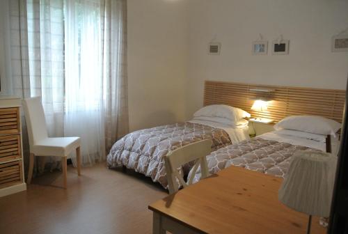 Un pat sau paturi într-o cameră la B&B Via Dei Templi