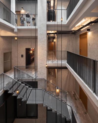 a view of a staircase in a building at Luk Hostel in Bangkok
