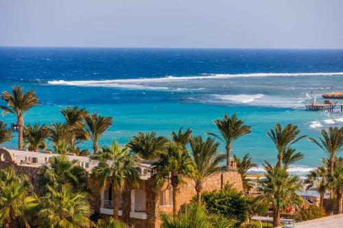a view of the beach and the ocean at Brayka Bay Reef Resort in Abu Dabab