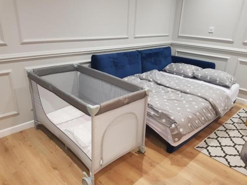 Postel nebo postele na pokoji v ubytování Apartament Tarnovianka - Centrum