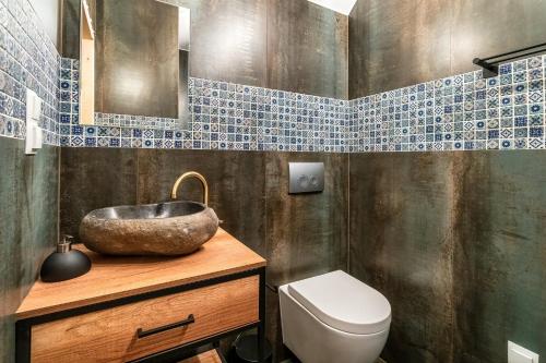 Koupelna v ubytování DOMEK W UBOCY z widokiem na Giewont "Jacuzzi i Sauna w ofercie dodatkowo płatnej"