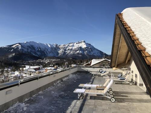 a balcony with a view of a mountain at Residence Aurora in Lavarone