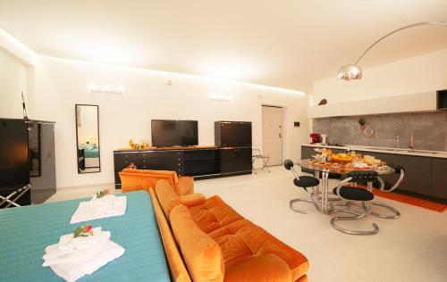 a living room with a couch and a table at South Valley in Agrigento