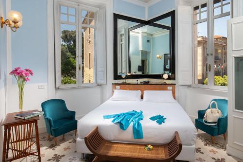 Postel nebo postele na pokoji v ubytování Hotel Emona Aquaeductus