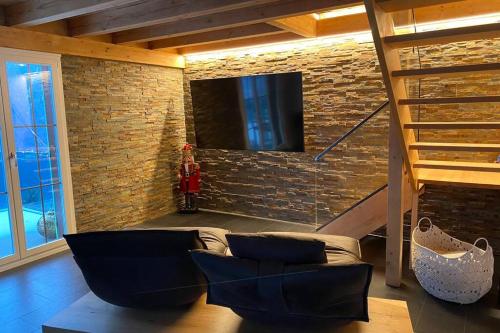 Fotografie z fotogalerie ubytování Exklusives Chalet mit traumhafter See- und Bergsicht v destinaci Seelisberg