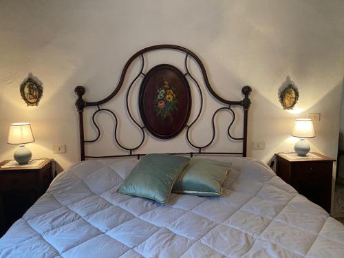 Postel nebo postele na pokoji v ubytování Casa Vacanze Beppina Cortona