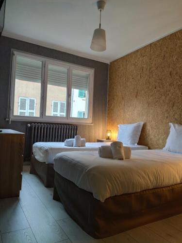 Posteľ alebo postele v izbe v ubytovaní BAR HOTEL DU CENTRE (BDC)