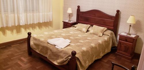 Кровать или кровати в номере Amplio y cómodo Dpto. céntrico a 2 cuadras del Mar