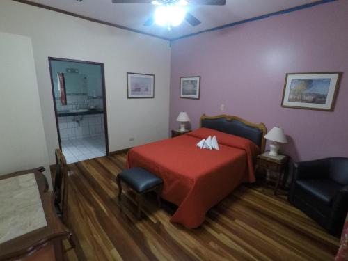 Ένα ή περισσότερα κρεβάτια σε δωμάτιο στο La Bergerac Boutique Hotel
