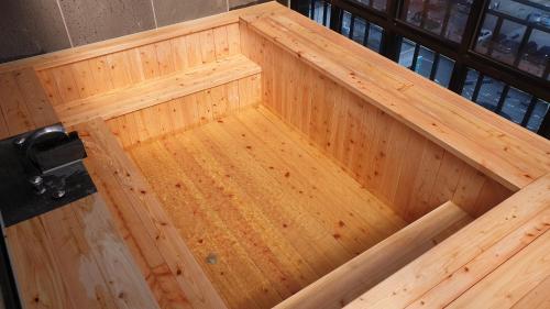 an overhead view of a wooden box in a room at Louis Boutique Hotel in Changwon