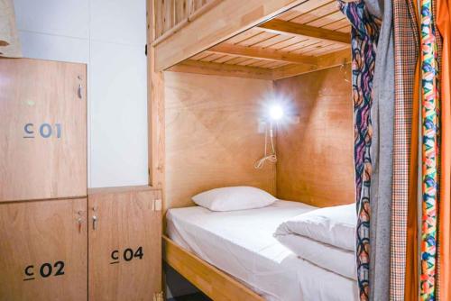Postel nebo postele na pokoji v ubytování Hostel TangaTable