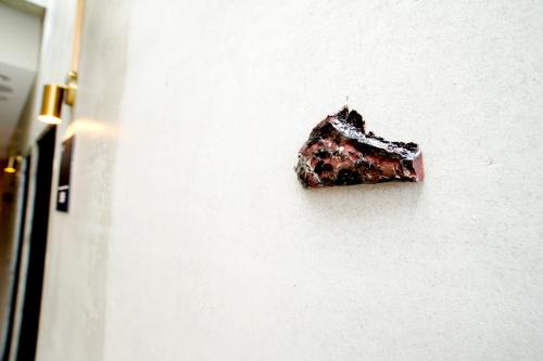 a piece of chocolate cake sitting on a counter at FFF Hotel in Hengchun