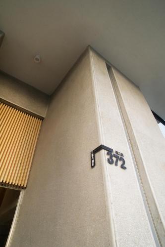 a corner of a room with the number on the wall at FFF Hotel in Hengchun