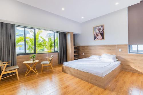 Giường trong phòng chung tại Palm Villa 30 (Luxury) Khu Nghĩ Dưỡng Cao Cấp