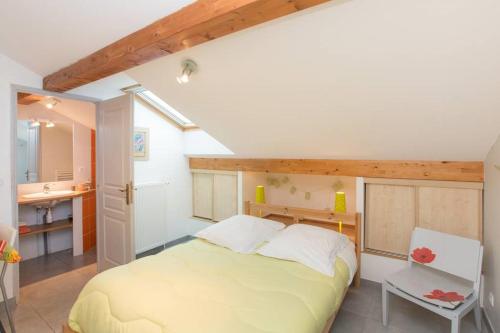 Postel nebo postele na pokoji v ubytování Chambres d'hôtes Les Coquelicots