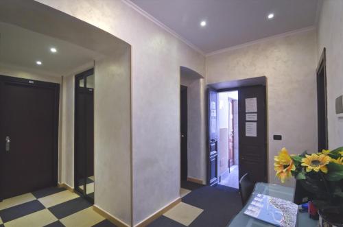 a hallway with a large mirror in a room at Memole Inn Sanremo in Sanremo