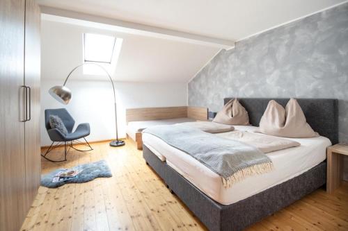Llit o llits en una habitació de Schusterhof-Appartments