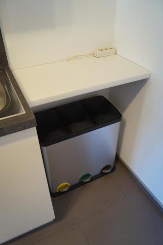 a white counter in a kitchen with a drawer at FEWO Außerlechner in Innsbruck