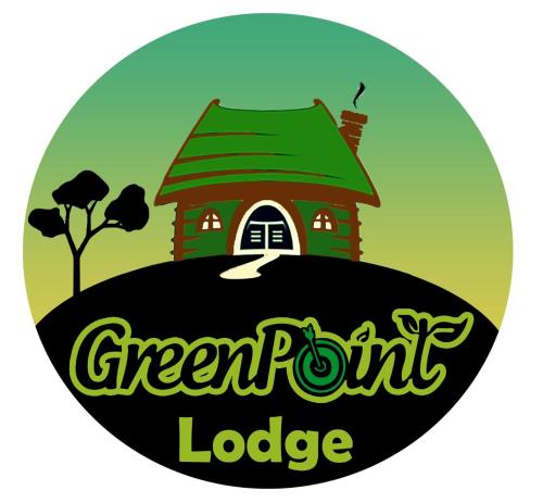a house on top of a hill with green paint lodge at GreenPoint Drake Bay in Drake