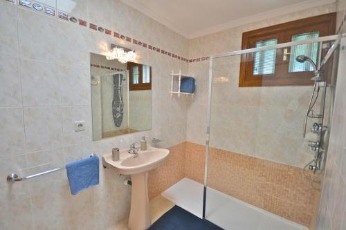a bathroom with a sink and a shower at Terracitas 28 & 27 in Playa Blanca