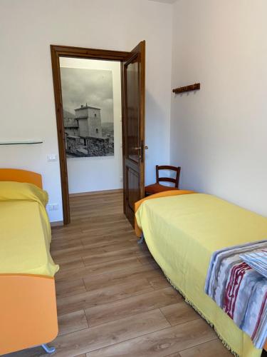 Een bed of bedden in een kamer bij RESIDENZA VILLA LEONIDA