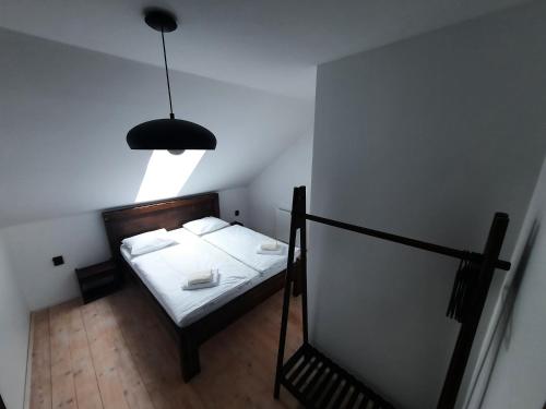 Postel nebo postele na pokoji v ubytování Nad Hřištěm 441
