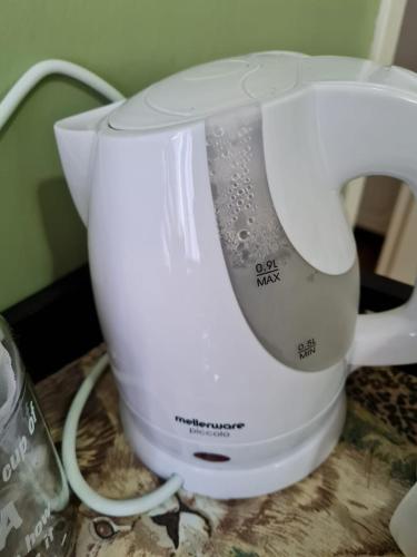 a white blender sitting on top of a counter at Serendipity NO TV in Polokwane