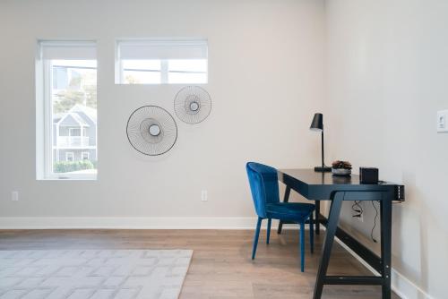 a desk and chair in a room with a window at Mason Lofts at West End in Nashville