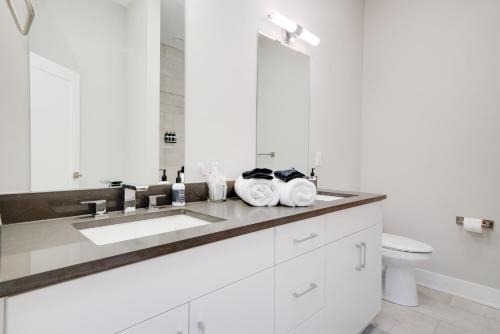 a bathroom with a sink and a toilet at Mason Lofts at West End in Nashville