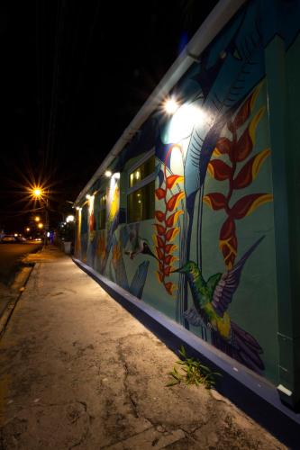 a train with a painting on the side of it at Casa Valeria Boutique Hotel in Sosúa