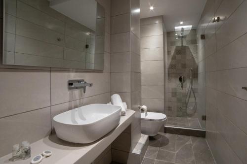 Kúpeľňa v ubytovaní Aphrodite Hotel & Apartments