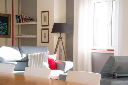a living room with a couch and a table at Monte Corgo da Vaca in Sabóia