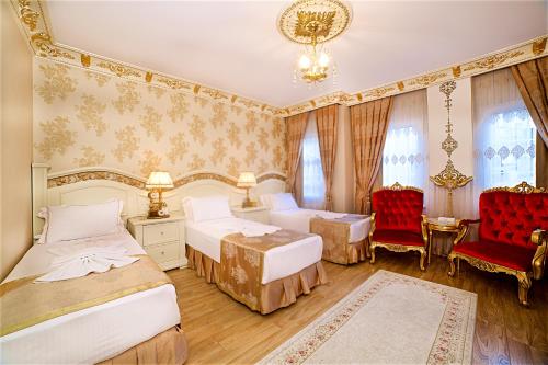 Postel nebo postele na pokoji v ubytování White House Hotel Istanbul